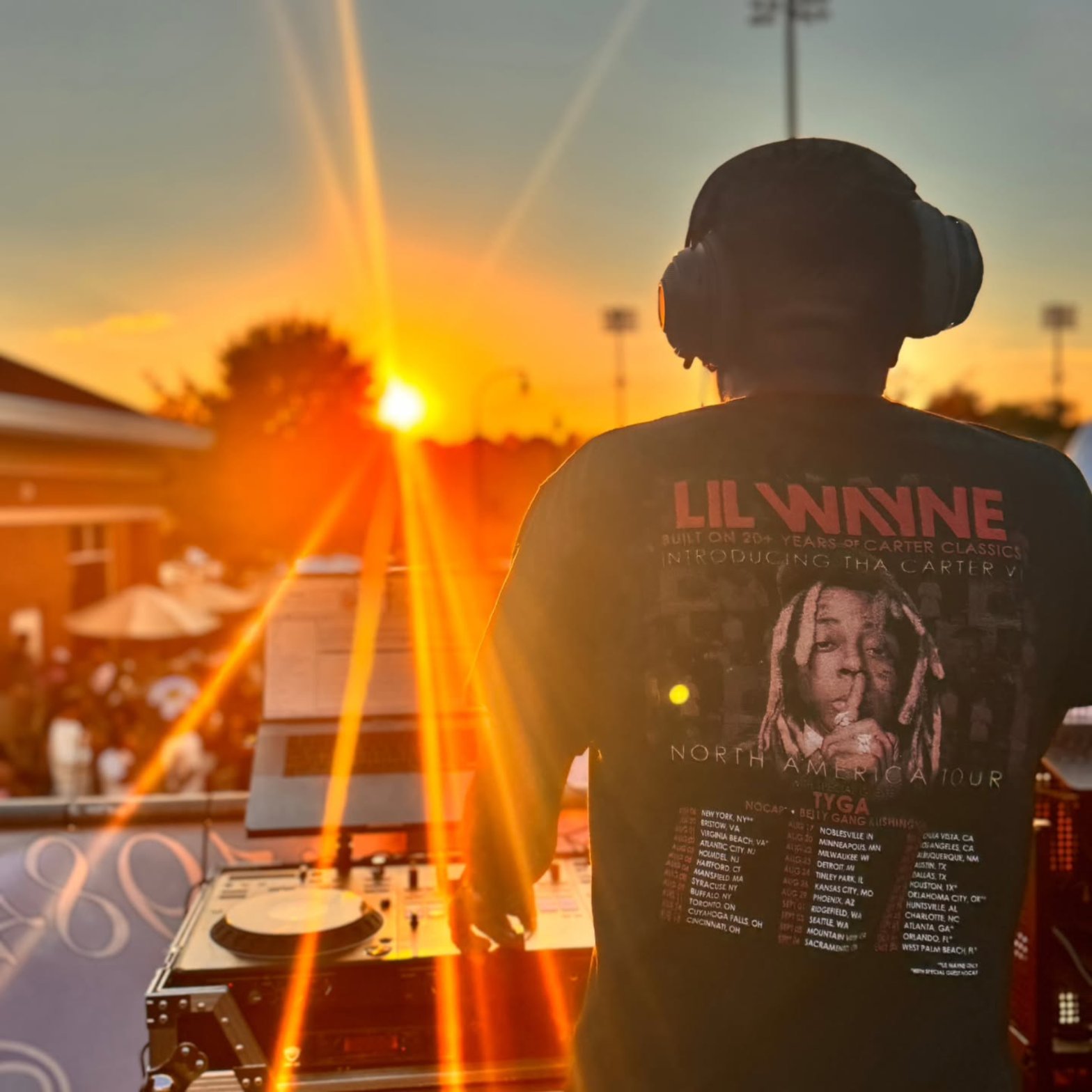 DJ Roco at the decks at sunset, Homecoming 2025